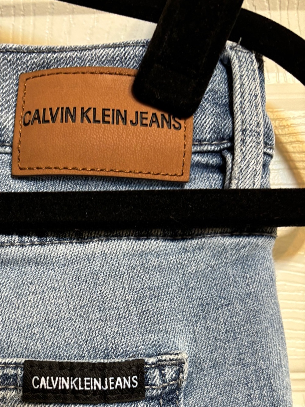 Calvin Klein Jeans Light Blue High-Rise Denim with Tan Patch and Black Tab